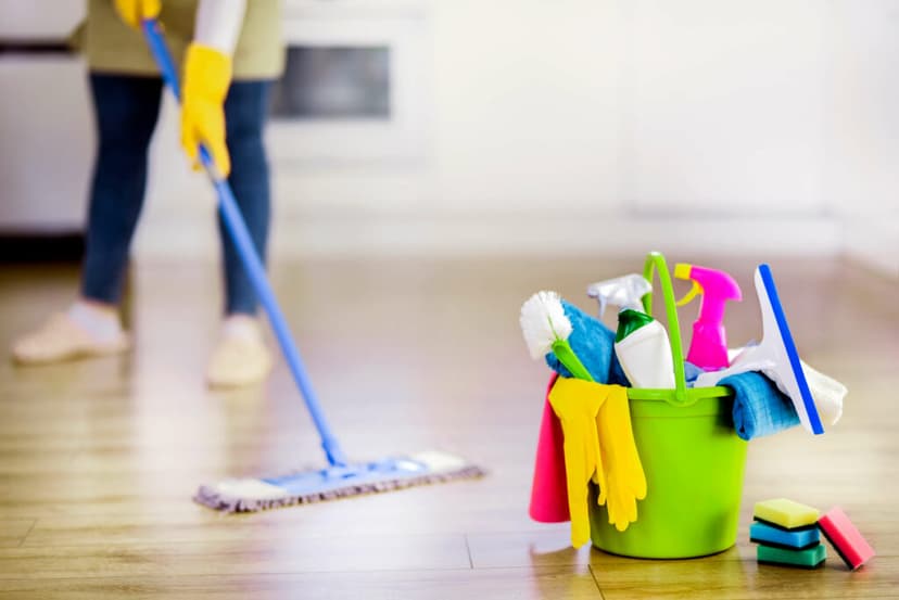 Lady mopping an empty home