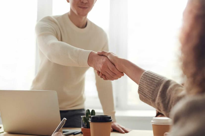 Guy shaking hands with his relative