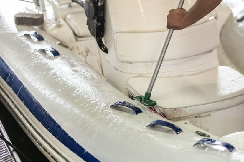 Scrubbing down the inside of a boat